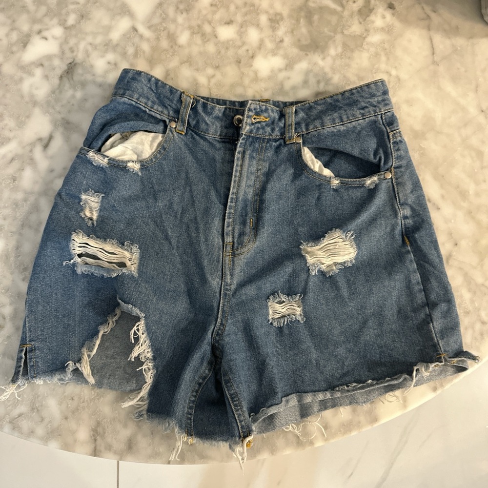 Ripped denim shorts